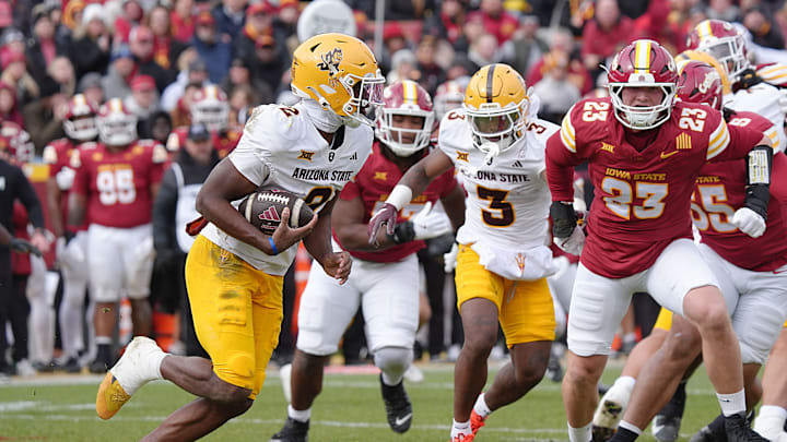 Arizona State Sun Devils quarterback Jeff Sims (2) runs with the ball as Iowa State Cyclones' linebacker Will McLaughlin (23) rushes to tackle during the first quarter in the Big-12 showdown at jack Trice Stadium on Nov. 1, 2025, in Ames, Iowa.