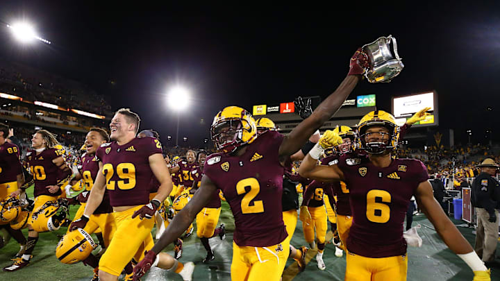 Arizona State Sun Devils wide receiver Brandon Aiyuk (2) holds-up the Territorial Cup trophy after defeating Arizona 24-14 at the 93rd Duel in the Desert on Nov. 30, 2019 in Tempe, Ariz.

Arizona Wildcats Vs Arizona State Sun Devils