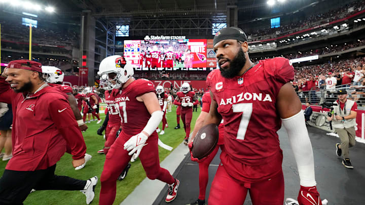 Arizona Cardinals linebacker Kyzir White holds onto the ball after intercepting a Dallas Cowboys pass. Arizona Cardinals linebacker Kyzir White holds onto the ball after intercepting a Dallas Cowboys pass.