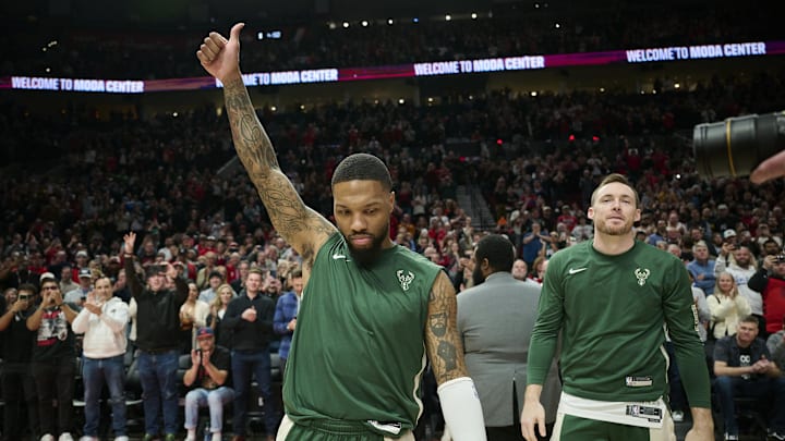 Jan 31, 2024; Portland, Oregon, USA; Milwaukee Bucks guard Damian Lillard (0) give fans a thumb up before a game against the Portland Trail Blazers at Moda Center. Mandatory Credit: Troy Wayrynen-Imagn Images