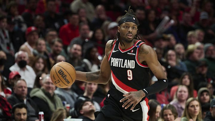 Jan 19, 2025; Portland, Oregon, USA; Portland Trail Blazers forward Jerami Grant (9) dribbles the basketball during the second half against the Chicago Bulls at Moda Center. Mandatory Credit: Troy Wayrynen-Imagn Images