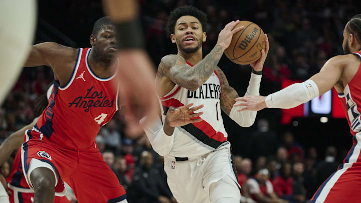 Jan 16, 2025; Portland, Oregon, USA; Portland Trail Blazers guard Anfernee Simons (1) drives to the basket during the second half against LA Clippers center Mo Bamba (4) at Moda Center. Mandatory Credit: Troy Wayrynen-Imagn Images Jan 16, 2025; Portland, Oregon, USA; Portland Trail Blazers guard Anfernee Simons (1) drives to the basket during the second half against LA Clippers center Mo Bamba (4) at Moda Center. Mandatory Credit: Troy Wayrynen-Imagn Images