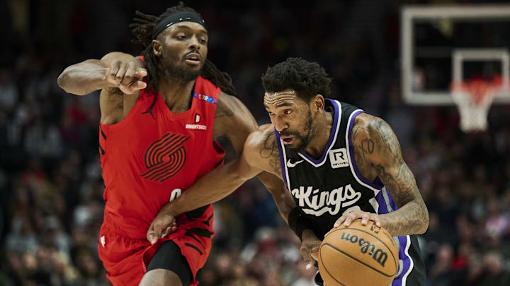 Feb 6, 2025; Portland, Oregon, USA; Sacramento Kings guard Malik Monk (0) drives to the basket during the second half against Portland Trail Blazers forward Jerami Grant (9) at Moda Center. Mandatory Credit: Troy Wayrynen-Imagn Images Feb 6, 2025; Portland, Oregon, USA; Sacramento Kings guard Malik Monk (0) drives to the basket during the second half against Portland Trail Blazers forward Jerami Grant (9) at Moda Center. Mandatory Credit: Troy Wayrynen-Imagn Images