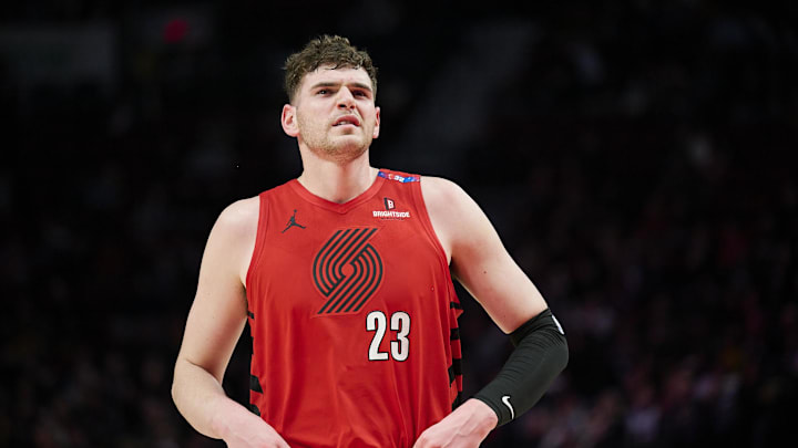 Feb 6, 2025; Portland, Oregon, USA; Portland Trail Blazers center Donovan Clingan (23) walks out to the court after a break during the first half against the Sacramento Kings at Moda Center. Mandatory Credit: Troy Wayrynen-Imagn Images