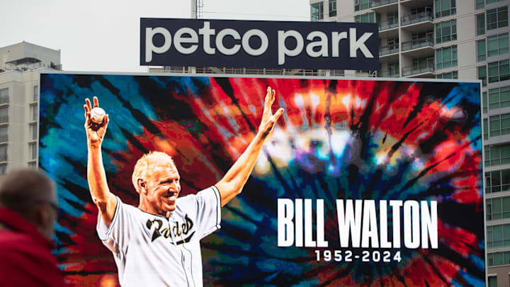 May 28, 2024; San Diego, California, USA; San Diego Padres observe a moment of silence for San Diego Icon Bill Walton who past away on May 27th, 2024 before a game against the Miami Marlins at Petco Park. Mandatory Credit: David Frerker-Imagn Images
