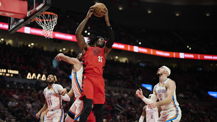 Jan 26, 2025; Portland, Oregon, USA; Portland Trail Blazers center Robert Williams III (35) grabs a rebound during the first half against Oklahoma City Thunder forward Jaylin Williams (6) at Moda Center. Mandatory Credit: Troy Wayrynen-Imagn Images Jan 26, 2025; Portland, Oregon, USA; Portland Trail Blazers center Robert Williams III (35) grabs a rebound during the first half against Oklahoma City Thunder forward Jaylin Williams (6) at Moda Center. Mandatory Credit: Troy Wayrynen-Imagn Images