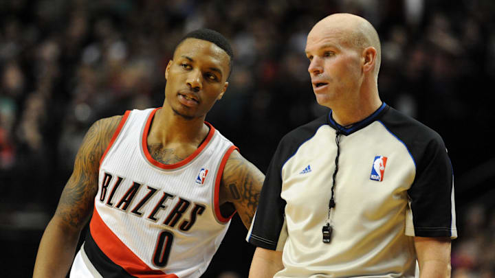 Jan. 04, 2014; Portland, OR, USA; Portland Trail Blazers point guard Damian Lillard (0) talks with referee Gary Zielinski (59) during the third quarter of the game against the Portland Trail Blazers at the Moda Center. The Sixers won the game 101-99. Mandatory Credit: Steve Dykes-Imagn Images Jan. 04, 2014; Portland, OR, USA; Portland Trail Blazers point guard Damian Lillard (0) talks with referee Gary Zielinski (59) during the third quarter of the game against the Portland Trail Blazers at the Moda Center. The Sixers won the game 101-99. Mandatory Credit: Steve Dykes-Imagn Images