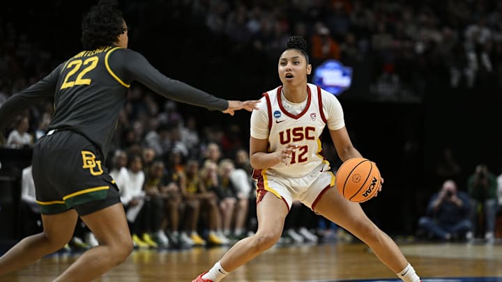 Mar 30, 2024; Portland, OR, USA; USC Trojans guard JuJu Watkins (12) steps back during the second half against Baylor Lady Bears guard Bella Fontleroy (22) in the semifinals of the Portland Regional of the 2024 NCAA Tournament at the Moda Center. Mandatory Credit: Troy Wayrynen-Imagn Images Mar 30, 2024; Portland, OR, USA; USC Trojans guard JuJu Watkins (12) steps back during the second half against Baylor Lady Bears guard Bella Fontleroy (22) in the semifinals of the Portland Regional of the 2024 NCAA Tournament at the Moda Center. Mandatory Credit: Troy Wayrynen-Imagn Images