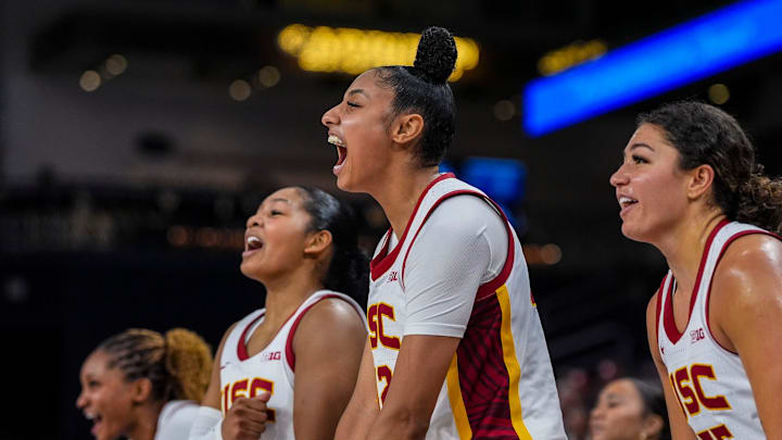 USC Trojans guard JuJu Watkins (12) cheers for her teammates from the bench during the fourth quarter of their game in the Acrisure Series in Palm Desert, Calif., Wednesday, Nov. 27, 2024. USC Trojans guard JuJu Watkins (12) cheers for her teammates from the bench during the fourth quarter of their game in the Acrisure Series in Palm Desert, Calif., Wednesday, Nov. 27, 2024.