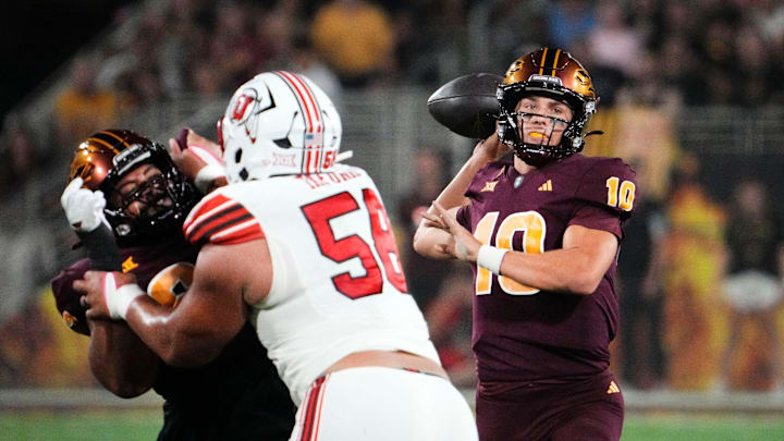 Arizona State Sun Devils quarterback Sam Leavitt (10) throws a touchdown pass to wide receiver Jordyn Tyson (0) against the Utah Utes in the first half at Mountain America Stadium in Tempe on Oct. 11, 2024.