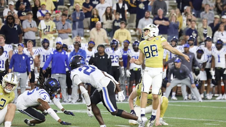 Gavin Stewart (88) of Savannah kicks a 37-yard field goal on Georgia Tech's first overtime possession in the 23-20 overtime victory over Duke on Oct. 8 at Bobby Dodd Stadium in Atlanta.Stewart, a Benedictine graduate, also made 22- and 23-yard field goals in regulation.
Ga Tech Kick In Ot Gavin Stewart (88) of Savannah kicks a 37-yard field goal on Georgia Tech's first overtime possession in the 23-20 overtime victory over Duke on Oct. 8 at Bobby Dodd Stadium in Atlanta.Stewart, a Benedictine graduate, also made 22- and 23-yard field goals in regulation.
Ga Tech Kick In Ot