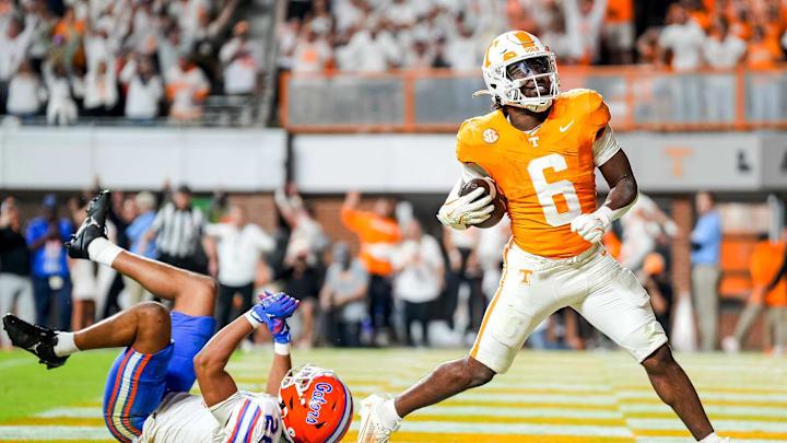 Oct 12, 2024; Knoxville, Tennessee, USA; Tennessee Volunteers running back Dylan Sampson (6) scores a touchdown against the Florida Gators at Neyland Stadium. Mandatory Credit: Brianna Paciorka/USA TODAY Network via Imagn Images Oct 12, 2024; Knoxville, Tennessee, USA; Tennessee Volunteers running back Dylan Sampson (6) scores a touchdown against the Florida Gators at Neyland Stadium. Mandatory Credit: Brianna Paciorka/USA TODAY Network via Imagn Images