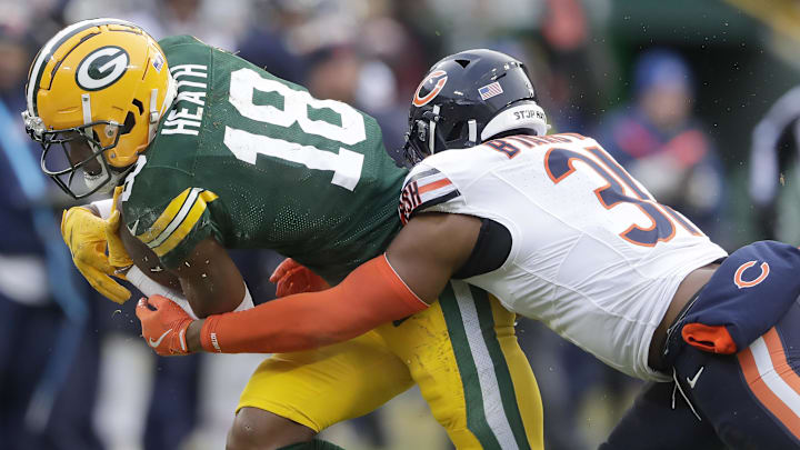 Kevin Byard drags down Malik Heath in the season finale at Green Bay, a 24-22 Bears victory.