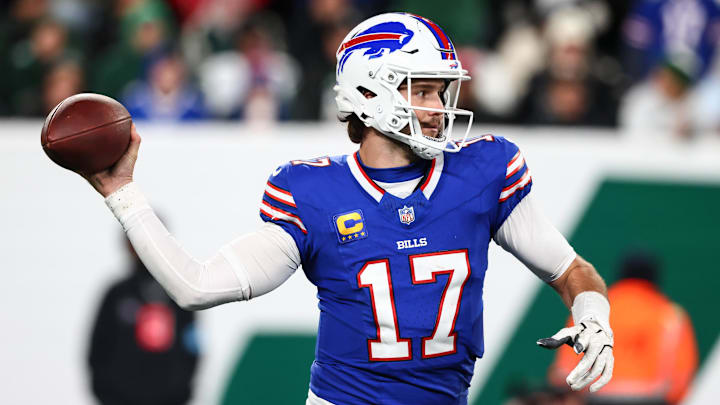 Oct 14, 2024; East Rutherford, New Jersey, USA; Buffalo Bills quarterback Josh Allen (17) throws a pass against the New York Jets during the second half at MetLife Stadium. 