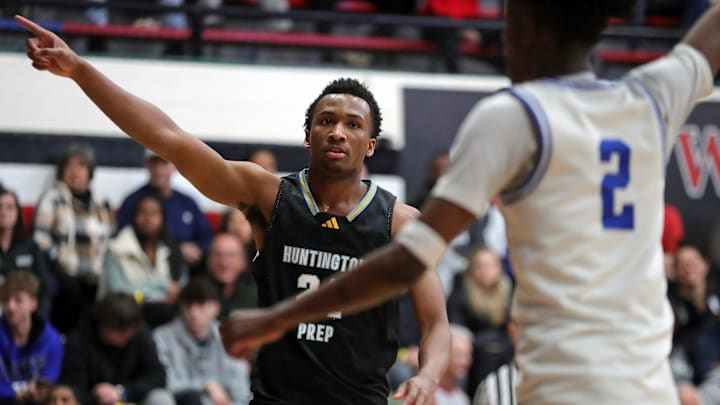 Huntington Prep guard Darryn Peterson signals for possession of the ball against Richmond Heights during the first half of a basketball game in the Canton Play-By-Play Classic at Canton Memorial Field House, Saturday, Feb. 17, 2024, in Canton, Ohio.