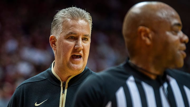 Purdue Head Coach Matt Painter talks with a referee during the Indiana versus Purdue game
