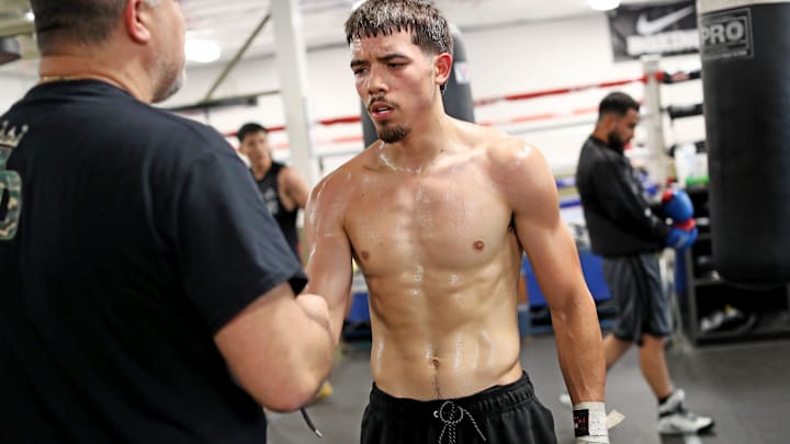 Manny Flores trains for his next main event bout at Diaz Brothers Boxing gym in Indio, Calif., on June 1, 2023.