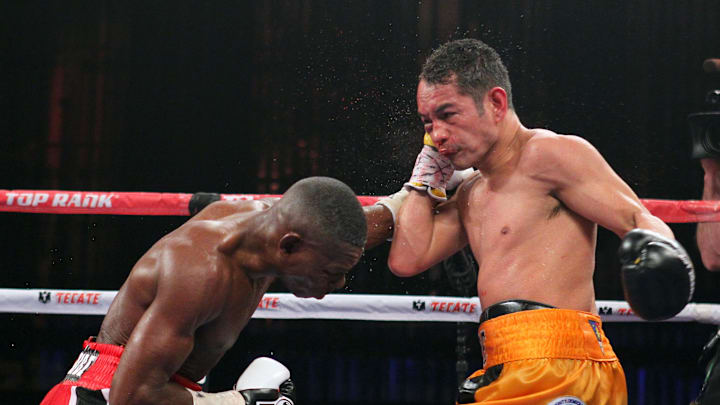 Apr 13, 2013; New York, NY, USA; Nonito Donaire (Yellow/Black Trunks) and Guillermo Rigondeaux (Green/White trunks) trade punches during their 12-round WBO/WBA Super Bantamweight title fight at Radio City Music Hall. Mandatory Credit: Ed Mulholland-Imagn Images Apr 13, 2013; New York, NY, USA; Nonito Donaire (Yellow/Black Trunks) and Guillermo Rigondeaux (Green/White trunks) trade punches during their 12-round WBO/WBA Super Bantamweight title fight at Radio City Music Hall. Mandatory Credit: Ed Mulholland-Imagn Images