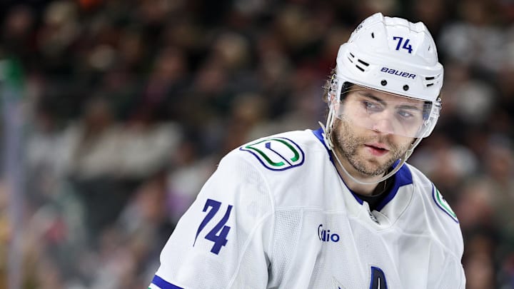 Dec 3, 2024; Saint Paul, Minnesota, USA; Vancouver Canucks left wing Jake DeBrusk (74) looks on during the third period against the Minnesota Wild at Xcel Energy Center. Mandatory Credit: Matt Krohn-Imagn Images