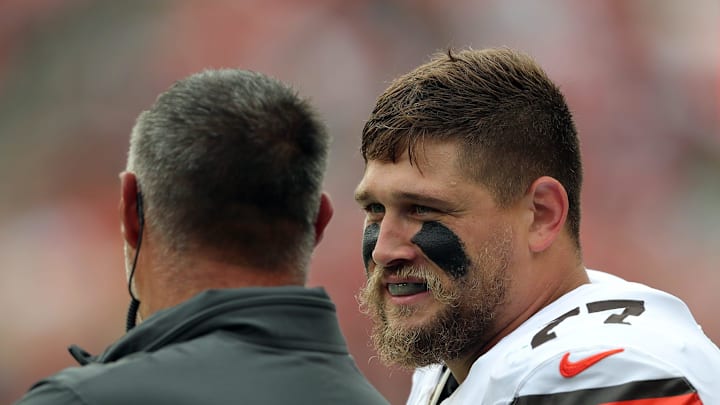 Cleveland Browns guard Wyatt Teller (77) chats with senior consultant Mike Vrabel on the sideline during the first half of an NFL preseason football game at Cleveland Browns Stadium, Saturday, Aug. 10, 2024, in Cleveland, Ohio. Cleveland Browns guard Wyatt Teller (77) chats with senior consultant Mike Vrabel on the sideline during the first half of an NFL preseason football game at Cleveland Browns Stadium, Saturday, Aug. 10, 2024, in Cleveland, Ohio.