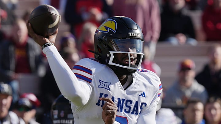 Kansas Jayhawks quarterback Jalon Daniels (6) passes the ball against Iowa State