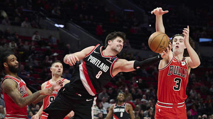  Portland Trail Blazers forward Deni Avdija (8) grabs a rebound during the second half against Chicago Bulls guard Josh Giddey (3) at Moda Center. Mandatory Credit: Troy Wayrynen-Imagn Images