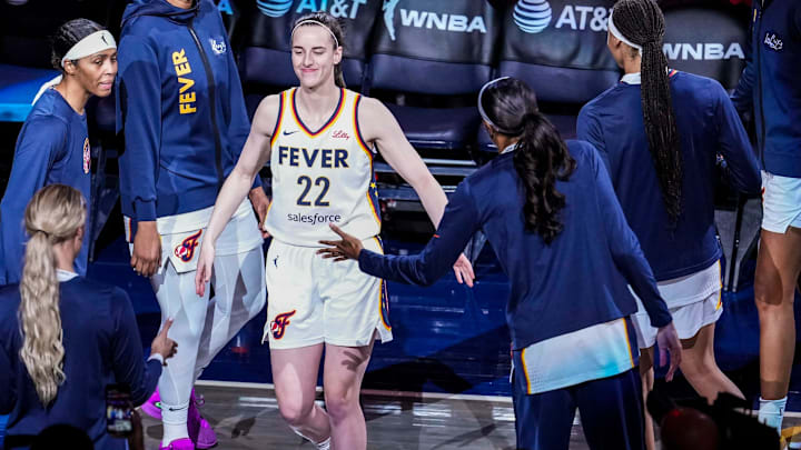 Indiana Fever guard Caitlin Clark (22) is introduced Saturday, May 24, 2025, during a game between the Indiana Fever and the New York Liberty at Gainbridge Fieldhouse in Indianapolis. Indiana Fever guard Caitlin Clark (22) is introduced Saturday, May 24, 2025, during a game between the Indiana Fever and the New York Liberty at Gainbridge Fieldhouse in Indianapolis.