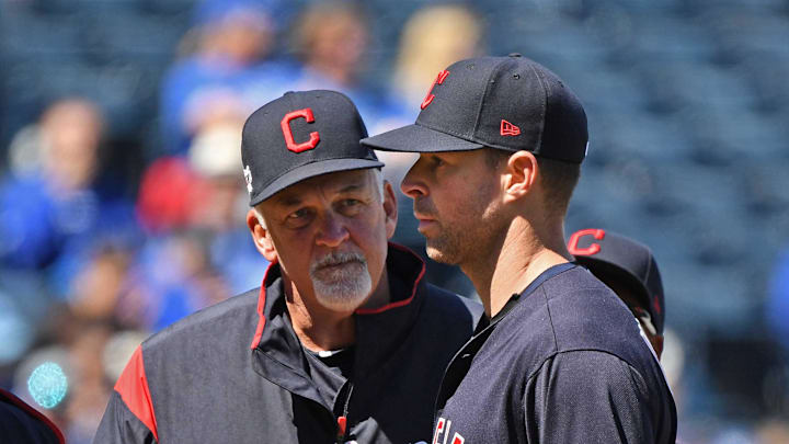 Apr 14, 2019; Kansas City, MO, USA; Cleveland Indians starting pitcher Corey Kluber (right) talks with pitching coach Carl Willis (left) during the third inning against the at Kauffman Stadium. Mandatory Credit: Peter G. Aiken/Imagn Images Apr 14, 2019; Kansas City, MO, USA; Cleveland Indians starting pitcher Corey Kluber (right) talks with pitching coach Carl Willis (left) during the third inning against the at Kauffman Stadium. Mandatory Credit: Peter G. Aiken/Imagn Images