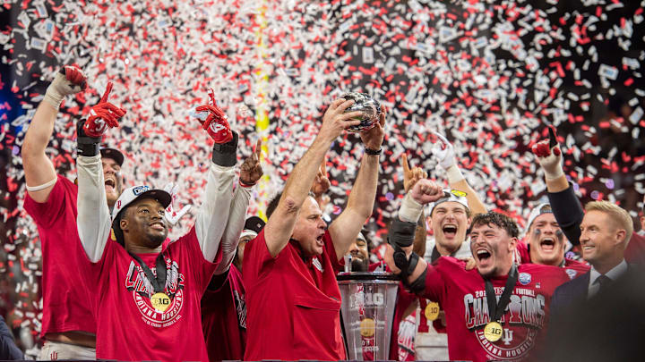 Indiana Head Coach Curt Cignetti and the Hoosiers celebrate after the Indiana versus Ohio State Big Ten Championship football game at Lucas Oil Stadium on Saturday, Dec. 6, 2025.