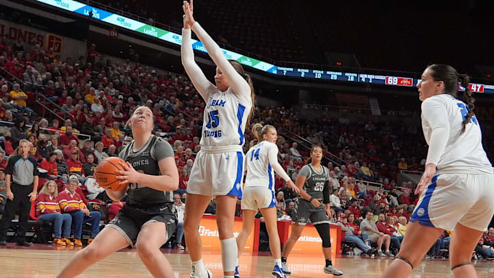 Iowa State Cyclones' guard Aili Tanke (32) looks for a shot around BYU Cougars guard Kemery Congdon (15) during the fourth quarter in the Big-12 women’s basketball at Hilton Coliseum on Wednesday, Jan. 22, 2025, in Ames, Iowa. Iowa State Cyclones' guard Aili Tanke (32) looks for a shot around BYU Cougars guard Kemery Congdon (15) during the fourth quarter in the Big-12 women’s basketball at Hilton Coliseum on Wednesday, Jan. 22, 2025, in Ames, Iowa.