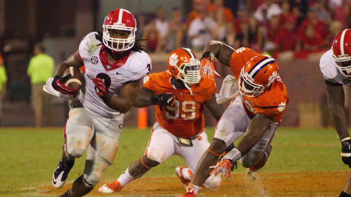 Aug 31, 2013; Clemson, SC, USA; Georgia Bulldogs running back Todd Gurley (3) carries the ball during the fourth quarter against the Clemson Tigers at Clemson Memorial Stadium. Tigers won 38-35. Mandatory Credit: Joshua S. Kelly-USA TODAY Sports Aug 31, 2013; Clemson, SC, USA; Georgia Bulldogs running back Todd Gurley (3) carries the ball during the fourth quarter against the Clemson Tigers at Clemson Memorial Stadium. Tigers won 38-35. Mandatory Credit: Joshua S. Kelly-USA TODAY Sports