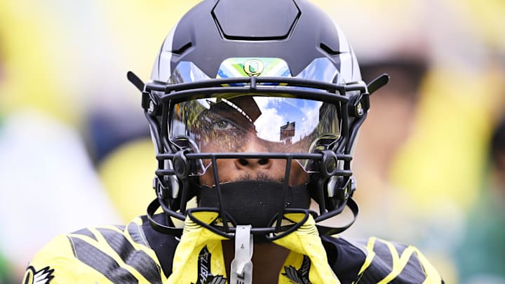 Oct 26, 2024; Eugene, Oregon, USA; Oregon Ducks wide receiver Tez Johnson (15) looks up during warm ups before a game against the Illinois Fighting Illini at Autzen Stadium. Mandatory Credit: Troy Wayrynen-Imagn Images