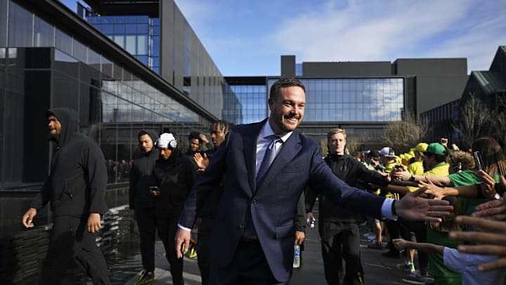 Oct 26, 2024; Eugene, Oregon, USA; Oregon Ducks head coach Dan Lanning greets fans before a game against the Illinois Fighting Illini at Autzen Stadium. Mandatory Credit: Troy Wayrynen-Imagn Images