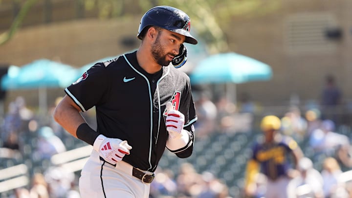 Arizona Diamondbacks Jordan Lawlar rounds the bases after hitting a two-run home run off Milwaukee Brewers pitcher Tyler Alexander in the second inning of a spring training game on Feb. 26, 2025, in Scottsdale at Salt River Fields at Talking Stick. Arizona Diamondbacks Jordan Lawlar rounds the bases after hitting a two-run home run off Milwaukee Brewers pitcher Tyler Alexander in the second inning of a spring training game on Feb. 26, 2025, in Scottsdale at Salt River Fields at Talking Stick.