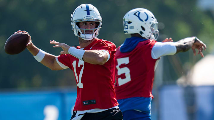 Indianapolis Colts quarterbacks Anthony Richardson Sr. (5) and Daniel Jones (17) pass Wednesday, July 23, 2025, during the first day of training camp held at Grand Park in Westfield. Indianapolis Colts quarterbacks Anthony Richardson Sr. (5) and Daniel Jones (17) pass Wednesday, July 23, 2025, during the first day of training camp held at Grand Park in Westfield.