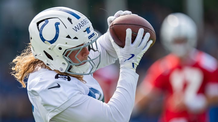 Indianapolis Colts tight end Tyler Warren (84) catches a pass Friday, July 25, 2025, during training camp held at Grand Park in Westfield. Indianapolis Colts tight end Tyler Warren (84) catches a pass Friday, July 25, 2025, during training camp held at Grand Park in Westfield.
