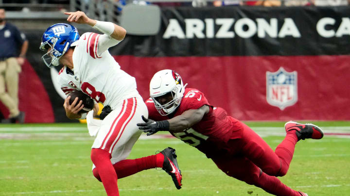Sep 17, 2023; Glendale, AZ, USA; Arizona Cardinals linebacker Krys Barnes (51) tackles New York Giants quarterback Daniel Jones (8) in the second half at State Farm Stadium. Sep 17, 2023; Glendale, AZ, USA; Arizona Cardinals linebacker Krys Barnes (51) tackles New York Giants quarterback Daniel Jones (8) in the second half at State Farm Stadium.