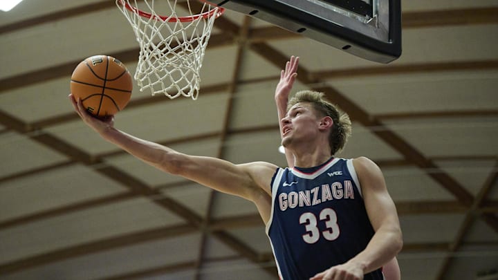 Gonzaga Bulldogs forward Ben Gregg (33) scores a basket during the second half against the Portland Pilots at Chiles Center Gonzaga Bulldogs forward Ben Gregg (33) scores a basket during the second half against the Portland Pilots at Chiles Center