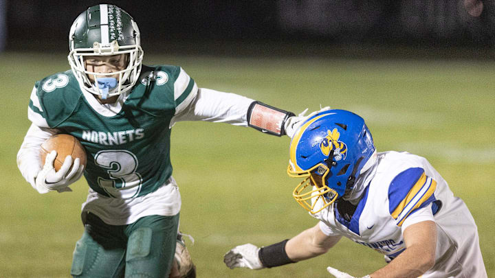 Malvern receiver Roy Simmons runs after a catch against East Canton, Friday, Oct. 25, 2024.
