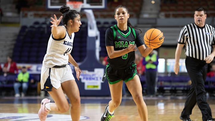 Vandals point guard Tamia Pietila (5) dribbles the ball up court at Arizona Veterans Memorial Coliseum in Phoenix on Feb. 24, 2024.