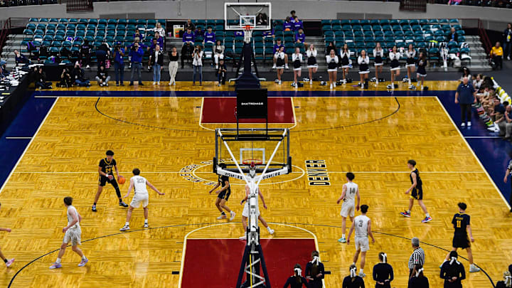 Teams compete in the Colorado state high school basketball tournament at the Denver Coliseum on Friday, March 10, 2023, in Denver, Colo.