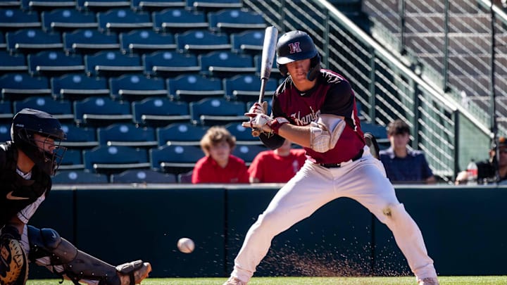 Hamilton Huskies Boston Kellner (22) bats against the Brophy College Prep Broncos during the 6A state playoffs at Tempe Diablo Stadium in Tempe on April 30, 2024.