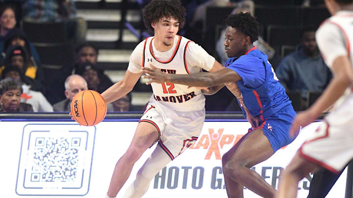 New Hanover’s #12 CJ Kornegay drives inside for a shot as they took on Mecklenburn in the 2025 NCHSAA Championship game on March 15, 2025 in Winston Salem . Mecklenburg beat New Hanover 59-56. KEN BLEVINS/STARNEWS