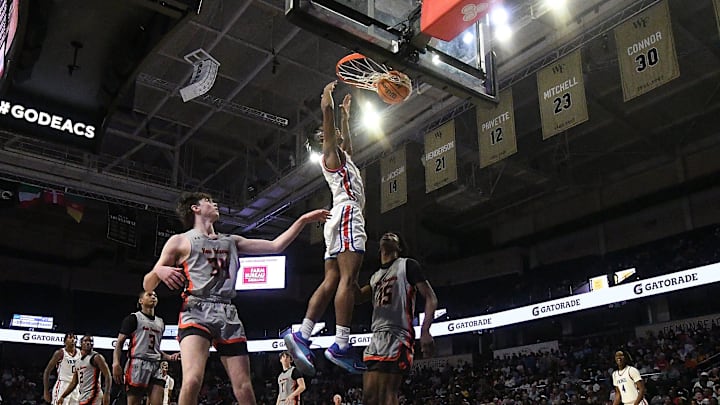 North Mecklenburg's Chadlyn Traylor dunks the ball as New Hanover took on North Mecklenburg in the 4A state championship game Saturday, March 16, 2024, at the LJVM Coliseum in Winston-Salem, N.C. Hanover lost 57-47. North Mecklenburg's Chadlyn Traylor dunks the ball as New Hanover took on North Mecklenburg in the 4A state championship game Saturday, March 16, 2024, at the LJVM Coliseum in Winston-Salem, N.C. Hanover lost 57-47.