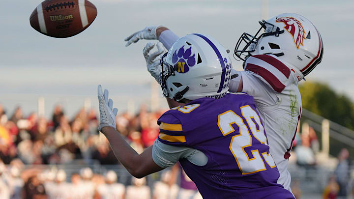 PCM’s defensive back Gavin Steenhoek (1) breaks up pass from Nevada's wide receiver/defensive back Lucas Brown (29) during the first quarter in the week two Iowa High school football at Cubs Stadium on Sept. 5, 2025, in Nevada, Iowa.