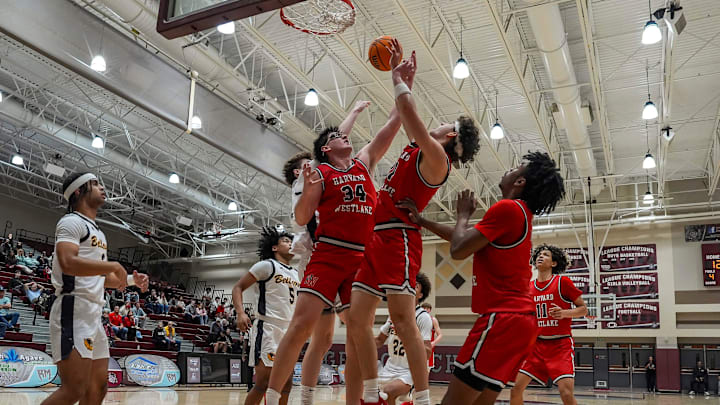 Harvard-Westlake reaches up for a rebound during the first quarter of their game in the Desert Holiday Classic in Rancho Mirage, Calif., Thursday, Dec. 26, 2024.