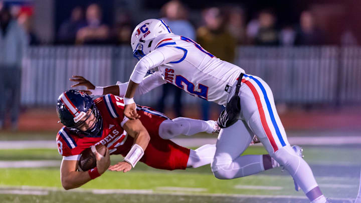 John Curtis Christian defense records a tackle of Teurlings Catholic quarterback Alex Munoz in a Division I quarterfinal playoff game John Curtis Christian defense records a tackle of Teurlings Catholic quarterback Alex Munoz in a Division I quarterfinal playoff game