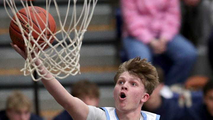 Menasha High School's Mason Lukasavage (23) against Shawano High School's Tristan Lawe (10) during their D2 boys basketball regional quarterfinal on Tuesday, March 3, 2026 in Menasha, Wis. Menasha defeated Shawano 83-60.
Wm. Glasheen USA TODAY NETWORK-Wisconsin