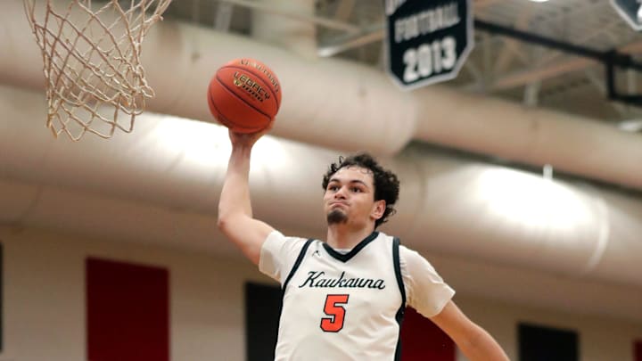 Kaukauna High School's Andrew Jensen (5) against Neenah High School during their Division 1 sectional semifinal boys basketball game on Thursday, March 12, 2026 at Kimberly High School in Kimberly, Wis. Kaukauna defeated Neenah 64-44.
Wm. Glasheen USA TODAY NETWORK-Wisconsin