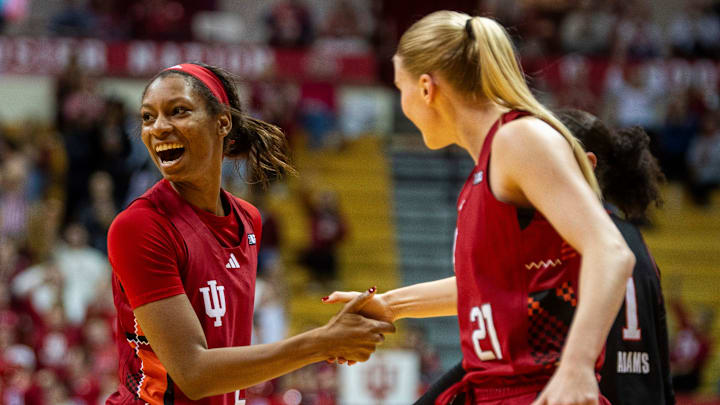 Indiana's Chloe Moore-McNeil (22) celebrates with Henna Sandvik (21) after Sandvik's made three-pointer during the Indiana versus Rutgers women's basketball game at Simon Skjodt Assembly Hall on Thursday, Feb. 6, 2025.